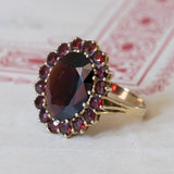 Vintage 8K gold daisy ring with garnets, 1960s