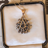 Antique pendant in 18K gold and silver with rosette cut diamonds, early 1900s