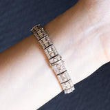 Bracciale semirigido vintage in oro bianco 18K con rubino naturale (0.90ct ca.) e diamanti (6.30ctw ca.), anni ‘60