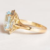 Anello vintage in oro giallo e in oro bianco 18K con topazio azzurro (4ct ca.), anni ‘60