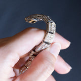 Bracciale semirigido vintage in oro bianco 18K con rubino naturale (0.90ct ca.) e diamanti (6.30ctw ca.), anni ‘60