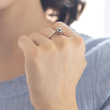 Bague marguerite en or blanc 14 carats avec diamants (0,57 ct environ), années 1950
