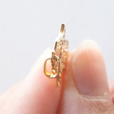 Ciondolo “Mano di Fatima” vintage in oro 18K con rubino, anni ‘70