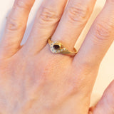 Anello vintage in oro 18K con granato e pietre bianche, anni ‘70