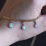Collana vintage in oro 18K con opali di taglio cabochon, anni ‘70