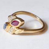 Anello contrarié vintage in oro 14K con zaffiro, rubino e diamanti (0.12ctw ca.), anni ‘70/‘80