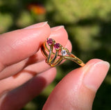 Anello vintage in oro 18K con diamante (0.03ct ca.) e rubini, anni ‘70