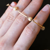 Braccialetto semirigido vintage in oro 14K con perle, anni ‘70