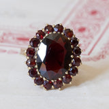 Vintage 8K gold daisy ring with garnets, 1960s