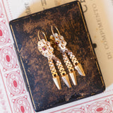 Orecchini in oro 18K con paste di vetro rosse, anni ‘40