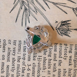Bague marguerite en or blanc 18 carats avec émeraude (2,37 ct) et diamants (0,50 ct)
