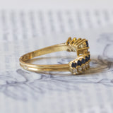 Vintage 18K gold ring with sapphires (0.50ctw approx.) And diamonds (0.20ctw approx.), 1970s
