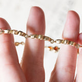 Braccialetto vintage in oro 8K con granati, anni ‘60/‘70