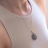 Antique pendant in 18K gold and silver with rosette cut diamonds, early 1900s