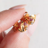 Orecchini vintage in oro giallo 18K con rubini e diamanti, anni ‘60