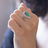 Bague marguerite en or blanc 18 carats avec émeraude (2,37 ct) et diamants (0,50 ct)