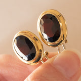 Orecchini vintage in oro giallo 18K con granati, anni ‘70