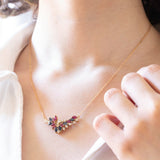 Vintage necklace in 18K gold with rubies, sapphires and diamonds (0.30ctw approx.), 1970s / 1980s