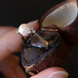 Anello vintage in oro bianco 14K con perla e diamanti (0.12ctw ca.), anni ‘60