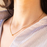 Collana vintage in oro 14K con punto luce di 0.10ct ca., anni ‘70/‘80