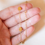 Demi parure comprendente collana e orecchino moderni in oro 18K con coccinelle con smalti, anni ‘90