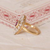 Antique navette ring in 18K gold with ruby and diamonds (0.14ctw approx.), 1930s / 40s