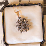 Antique pendant in 18K gold and silver with rosette cut diamonds, early 1900s