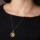 Ciondolo portafortuna antico con numero 13 in oro giallo 18K, anni ‘10/‘20