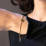 Braccialetto vintage in oro giallo 14K con diamante (0.01ct ca.), anni ‘60/‘70