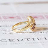Anello vintage in oro 18K con rubini (1.50ctw ca.) e diamanti (0.20ctw ca.), anni ‘70