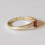 Vintage 14K gold ring with ruby (0.20ct approx.) And diamonds (0.15ctw approx.), 1970s