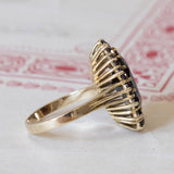 Vintage 8K gold daisy ring with garnets, 1960s