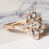 Anello vintage in oro giallo e in oro bianco 18K con diamanti (centrale di 0.10ct ca.), anni ‘60/‘70