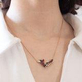 Vintage necklace in 18K gold with rubies, sapphires and diamonds (0.30ctw approx.), 1970s / 1980s