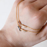 Coppia di collane vintage in oro 18K con rubini/zaffiri (0.50ctw ca.) e diamanti (0.50ctw ca.), anni ‘70