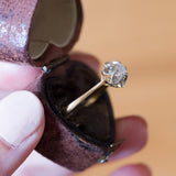 Solitaire en or 18 carats avec un diamant taille brillant d'environ 0,15 ct, années 1940