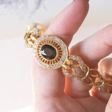 Braccialetto vintage in oro giallo e in oro bianco 18K con zaffiro (2.60ct ca.) e diamanti (1ctw ca.), anni ‘60