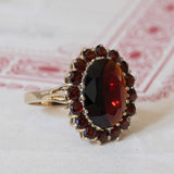 Vintage 8K gold daisy ring with garnets, 1960s