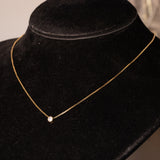 Collana vintage in oro 14K con punto luce di 0.10ct ca., anni ‘70/‘80