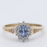 Anello a margherita vintage in oro giallo 9K con zaffiro (0.36ct ca.) e diamanti (0.12ctw ca.), anno 1989