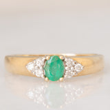 Vintage 9K yellow gold band ring with emerald (0.25ct approx.) and diamonds (0.12ctw approx.)
