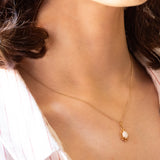 Ciondolo vintage in oro giallo 9K con opale (0.50ct ca.)