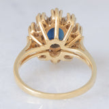Anello a margherita vintage in oro giallo 14K con zaffiro (1.30ct ca.) e diamanti di taglio brillante (0.47ctw ca.), anni ‘60/‘70