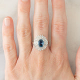 Anello a margherita vintage in platino con zaffiro (1.54ct) e diamanti (1.01ctw), anni ‘80