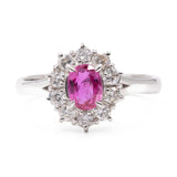 ANELLO A MARGHERITA IN PLATINO CON RUBINO (1.011 CT) E DIAMANTI (0.70 CTW)