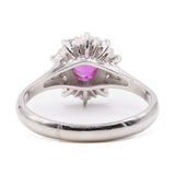 ANELLO A MARGHERITA IN PLATINO CON RUBINO (1.011 CT) E DIAMANTI (0.70 CTW)