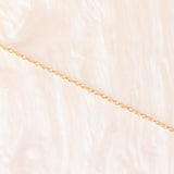 Vintage-Halskette mit Kette aus 9-karätigem Gelbgold und Anhänger aus 9-karätigem Gelb- und Weißgold mit blauem Topas im Herzschliff (ca. 0.60 ct), ca. 90er Jahre.