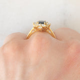 Anello a margherita navette in oro giallo 18K con zaffiro (1ct ca.) e diamanti di taglio brillante (0.75ctw ca.), anni ‘60/‘70