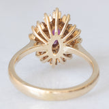 Anello ballerina vintage in oro giallo 14K con rubino (0.40ct ca.) e diamanti di taglio tapered (1ctw ca.), anni ‘70/‘80