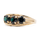 Anello trilogy vintage in oro giallo 8k con spinelli sintetici verdi